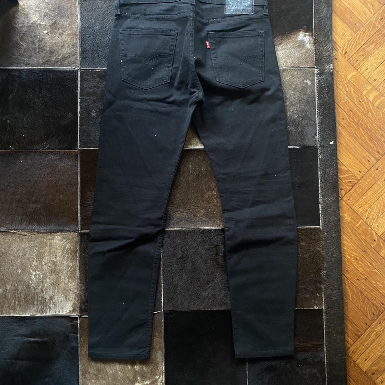 levis black ripped jeans