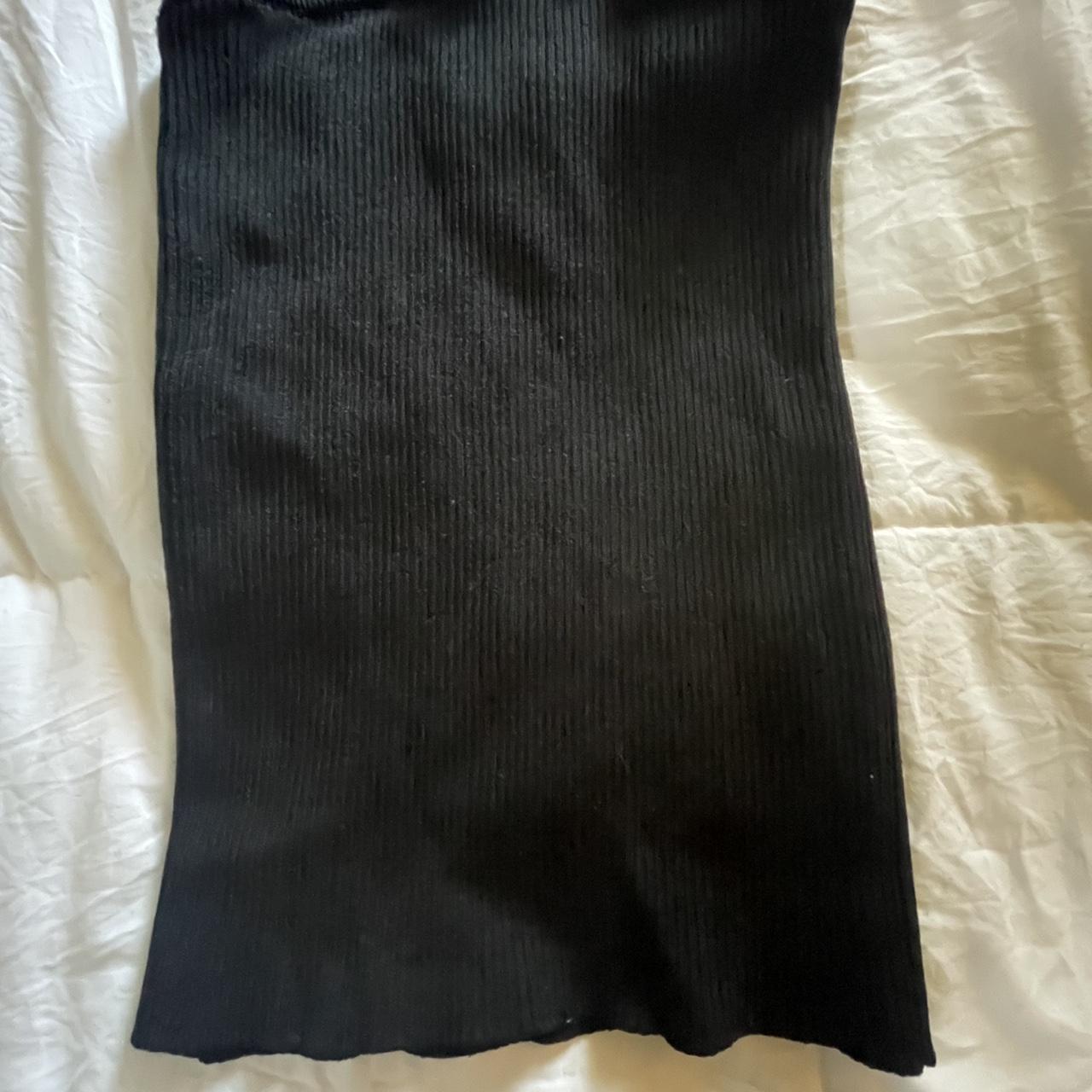 black ribbed tube top. photo has some glare, very... - Depop