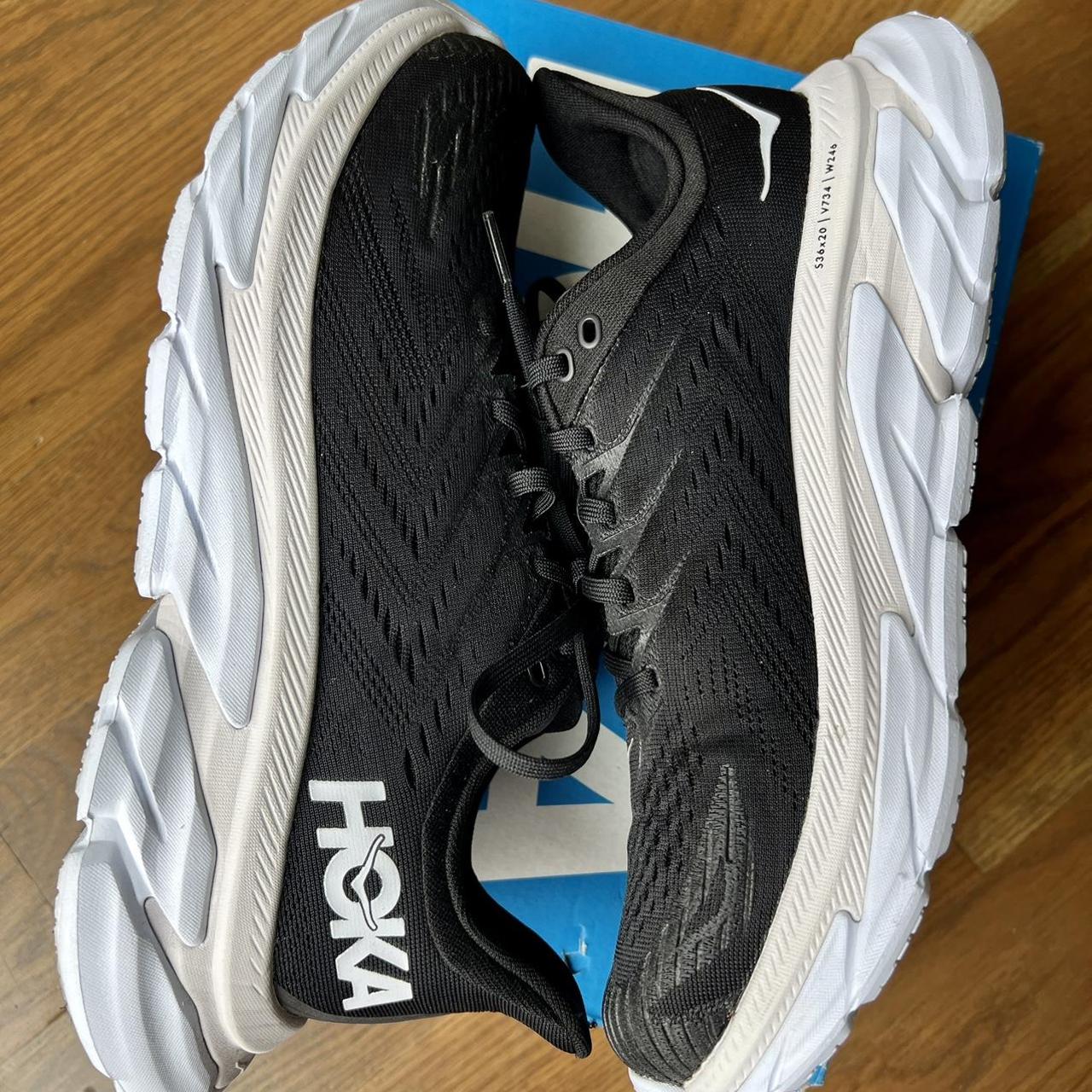 hoka one one black and white