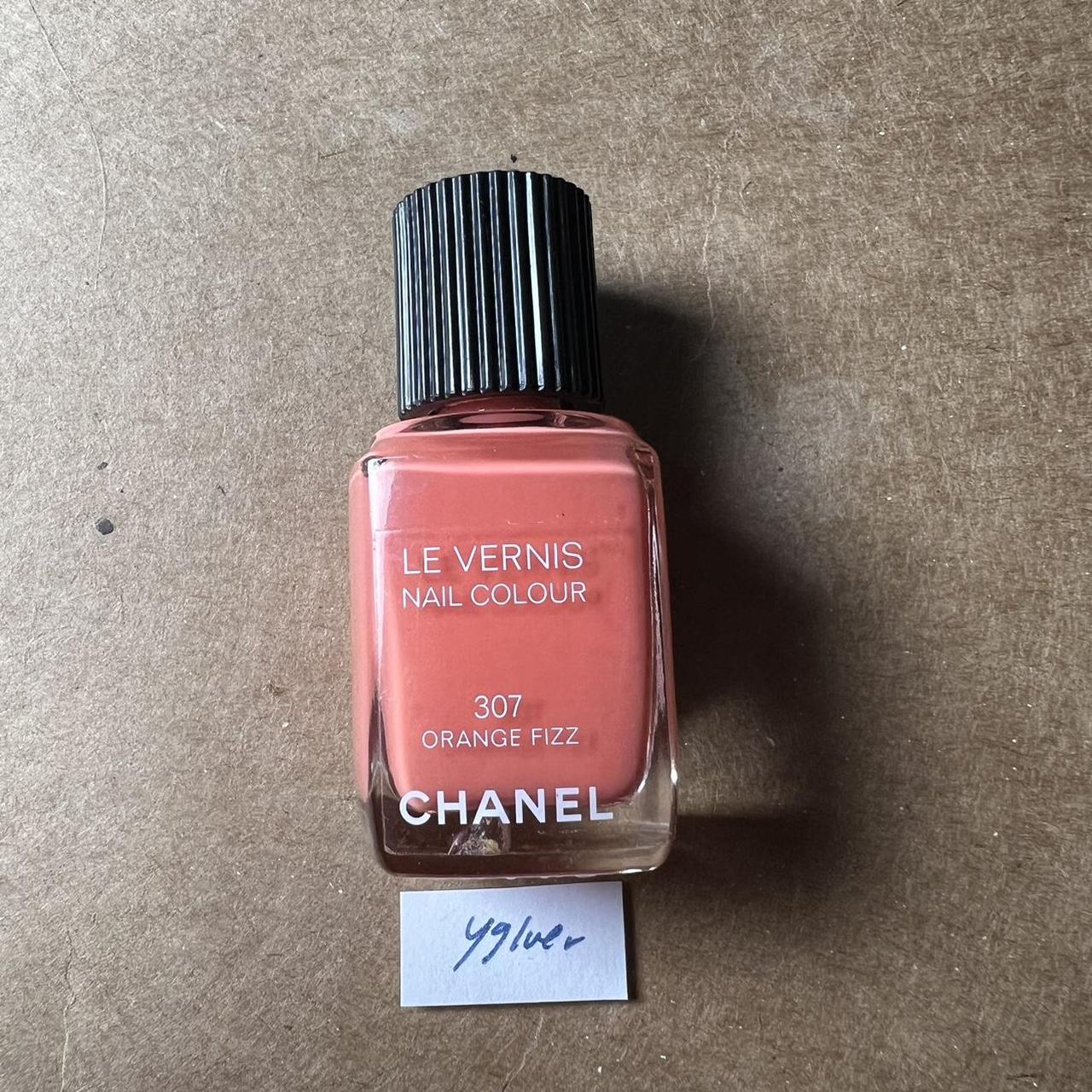 Chanel nail polish number 307 “orange fizz” , has...