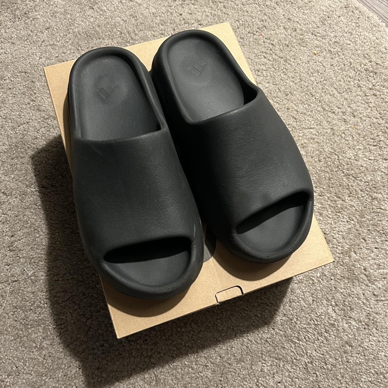 Yeezy Slides - Black Looking to get rid of these... - Depop