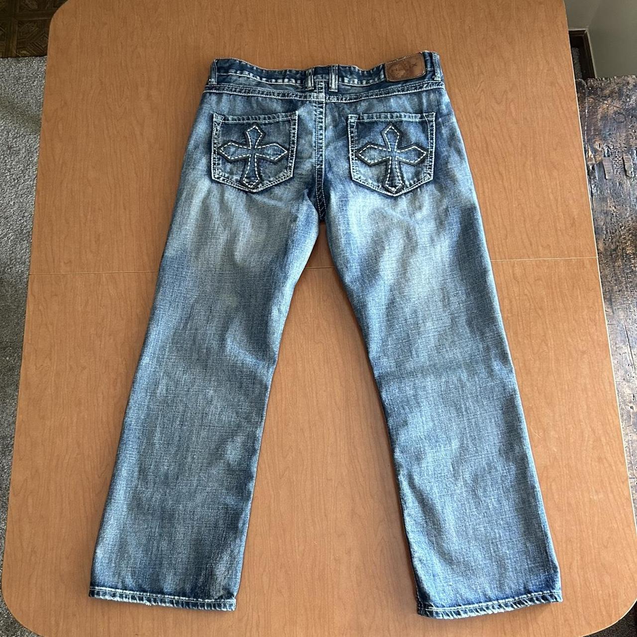 Vintage Helix distressed bootcut jeans with cross on... Depop