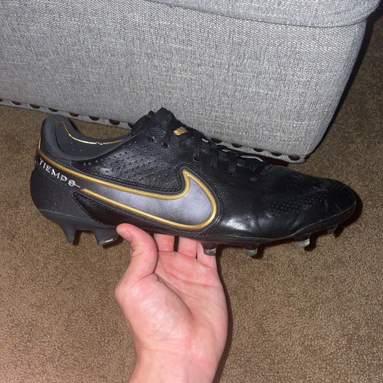 nike tiempo gold and black