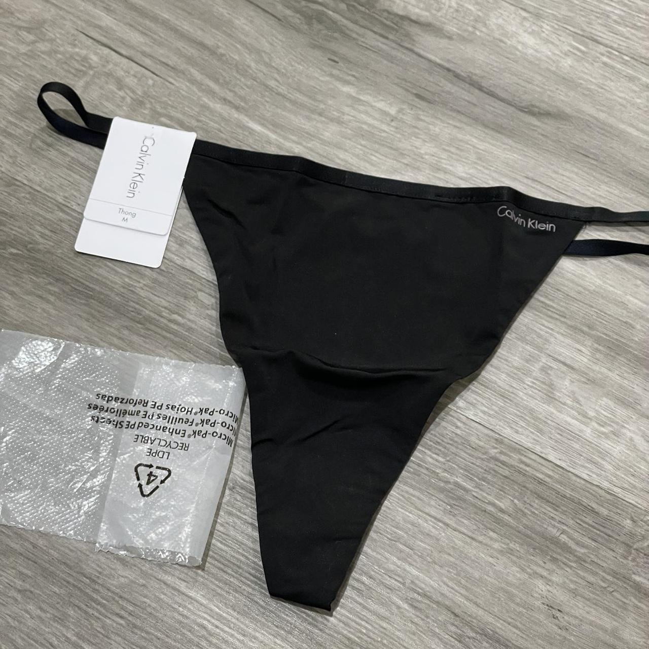 Calvin Klein black thong, brand new. #CalvinKlein... - Depop