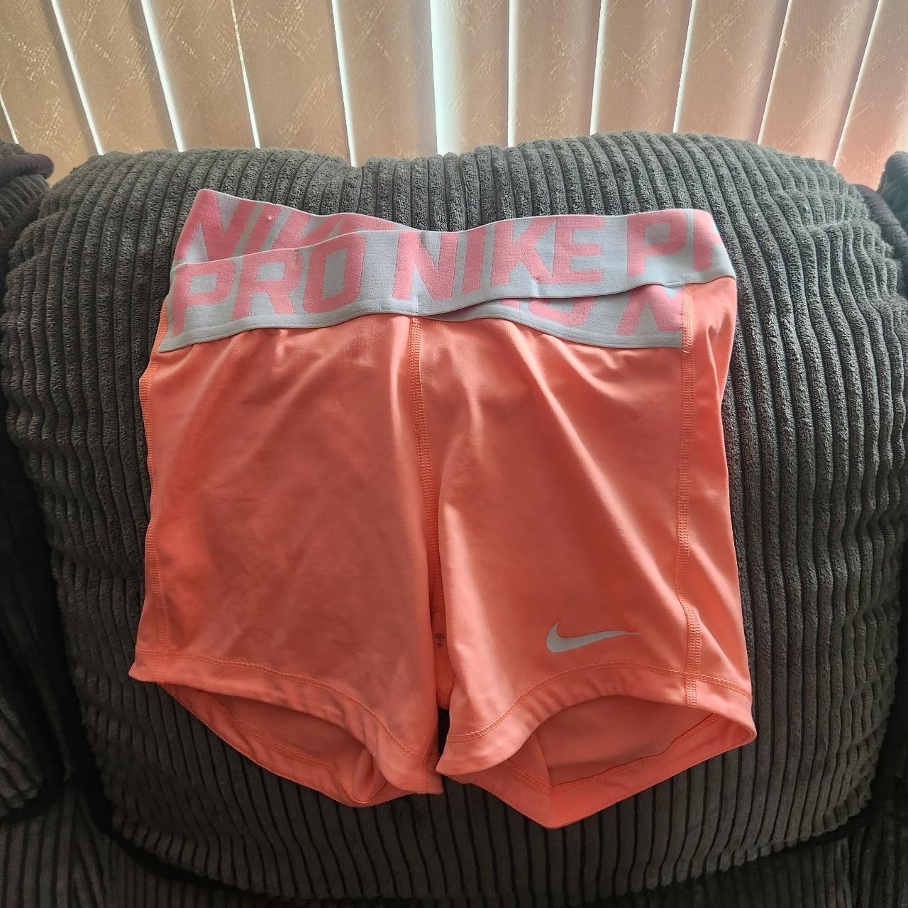 nike pro shorts coral