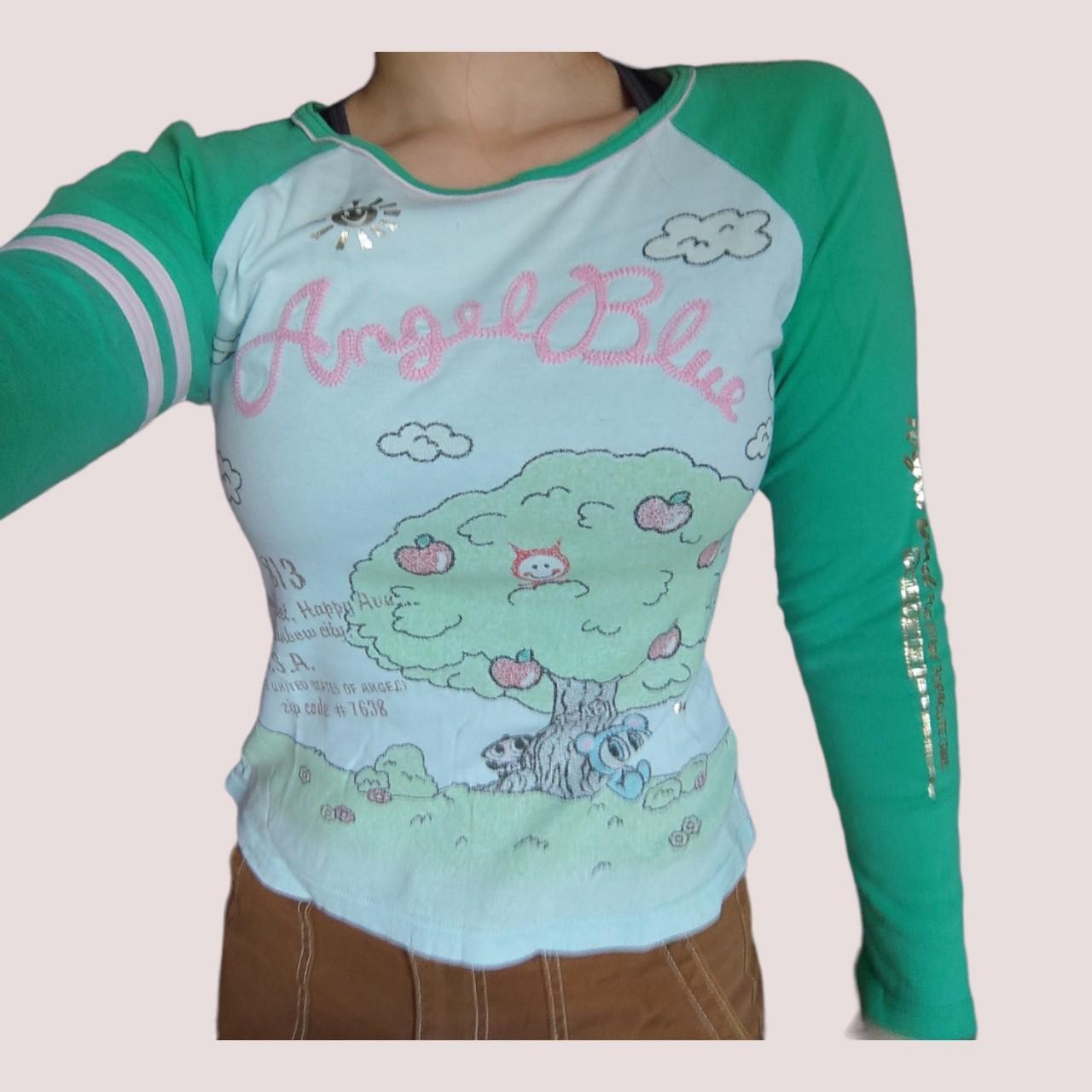 Cutest Angel Blue Japan graphic top —☆ Source from... Depop