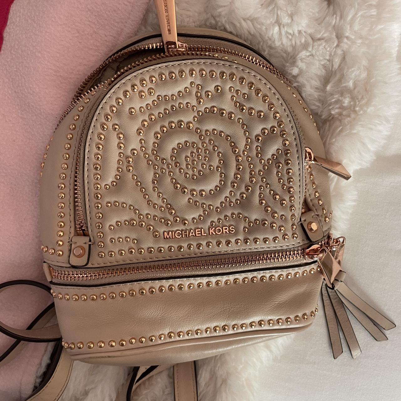 Michael Kors Mini Rosegold Backpack. Ive had this. Depop