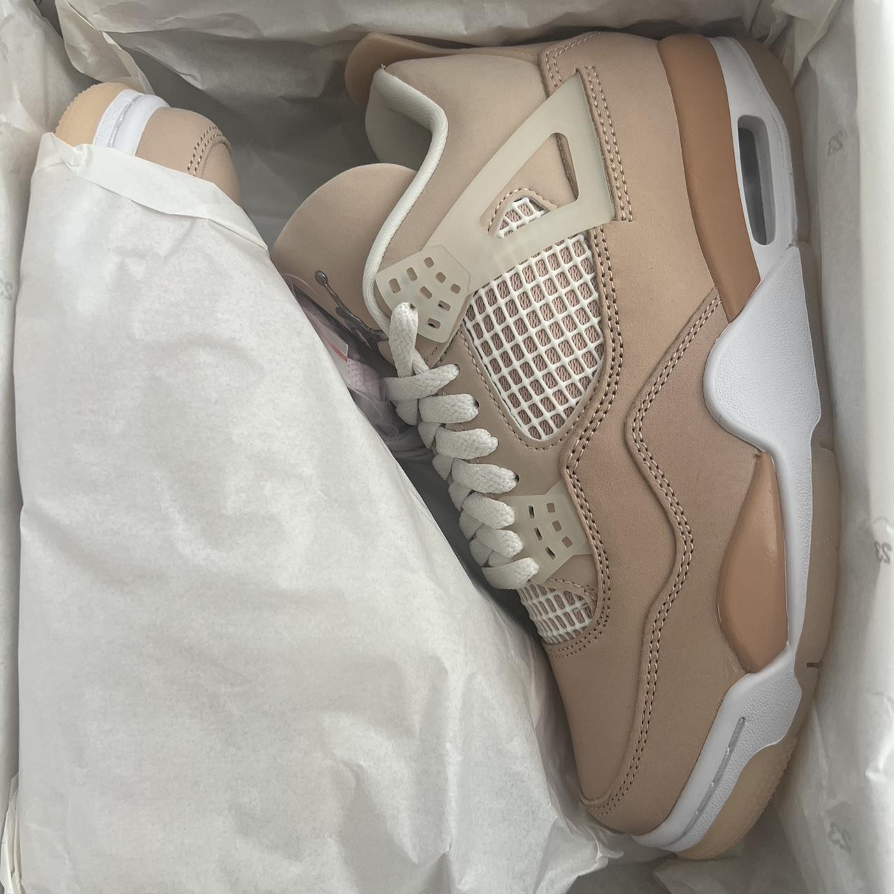 womens tan jordan 4