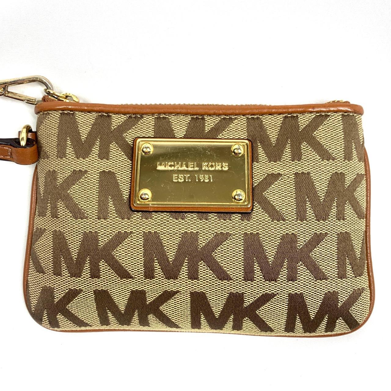 Wristlet wallet by Michael Michael Kors in Depop