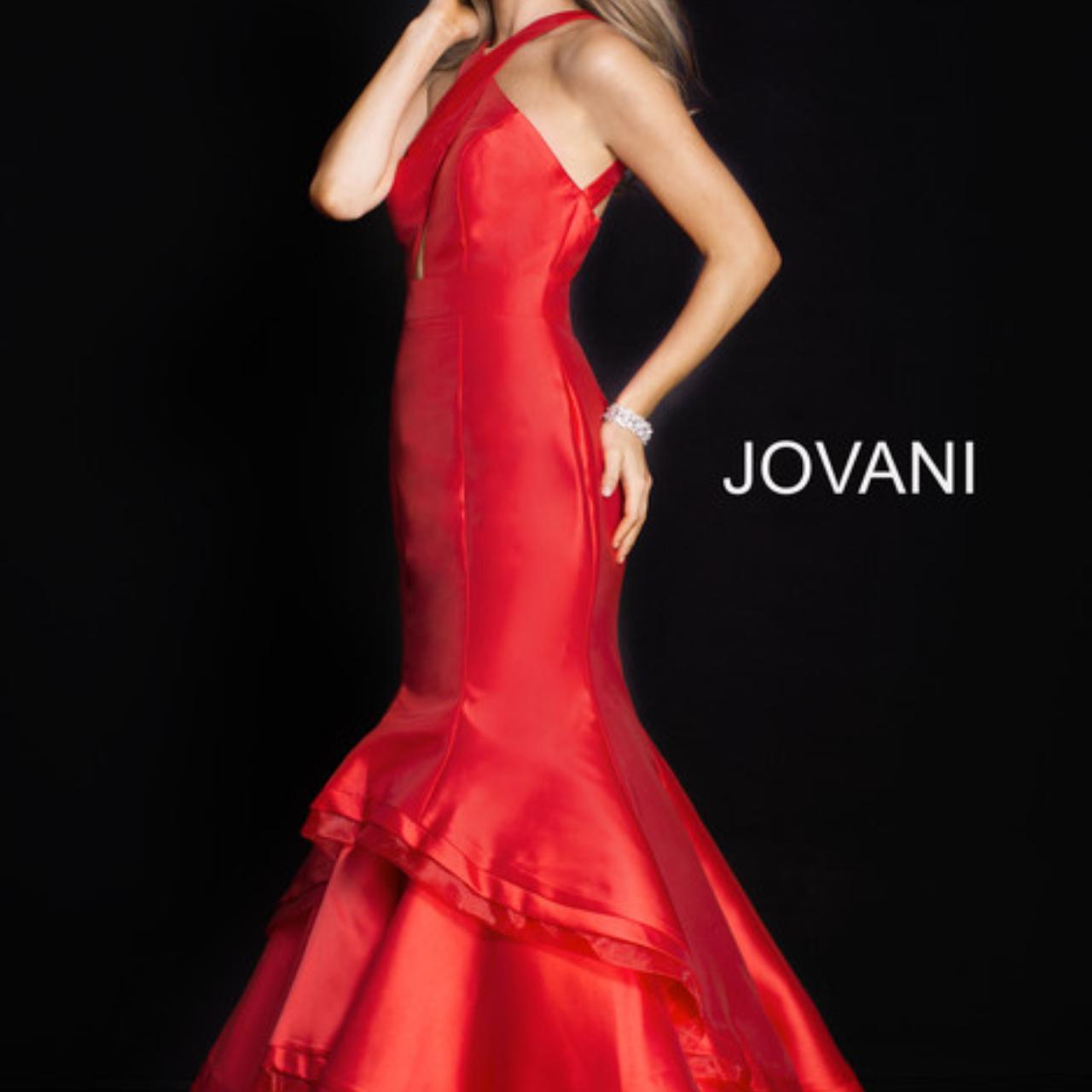Jovani red prom gown features a trumpet silhouette... - Depop