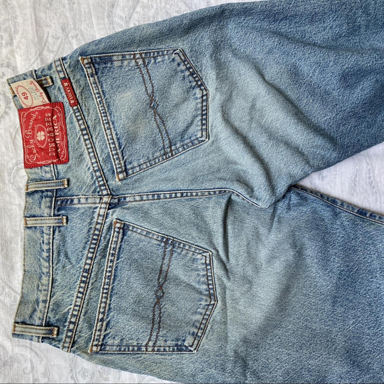 Vintage Lucky Brand jeans Light wash, various spots - Depop