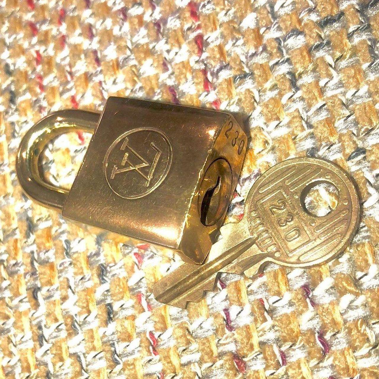 VINTAGE LOUIS VUITTON LOCK Authentic Louis Vuitton - Depop