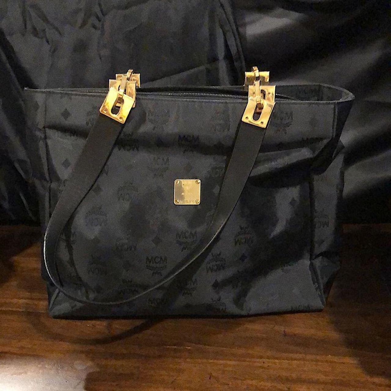 Black and gold mcm bag hotsell