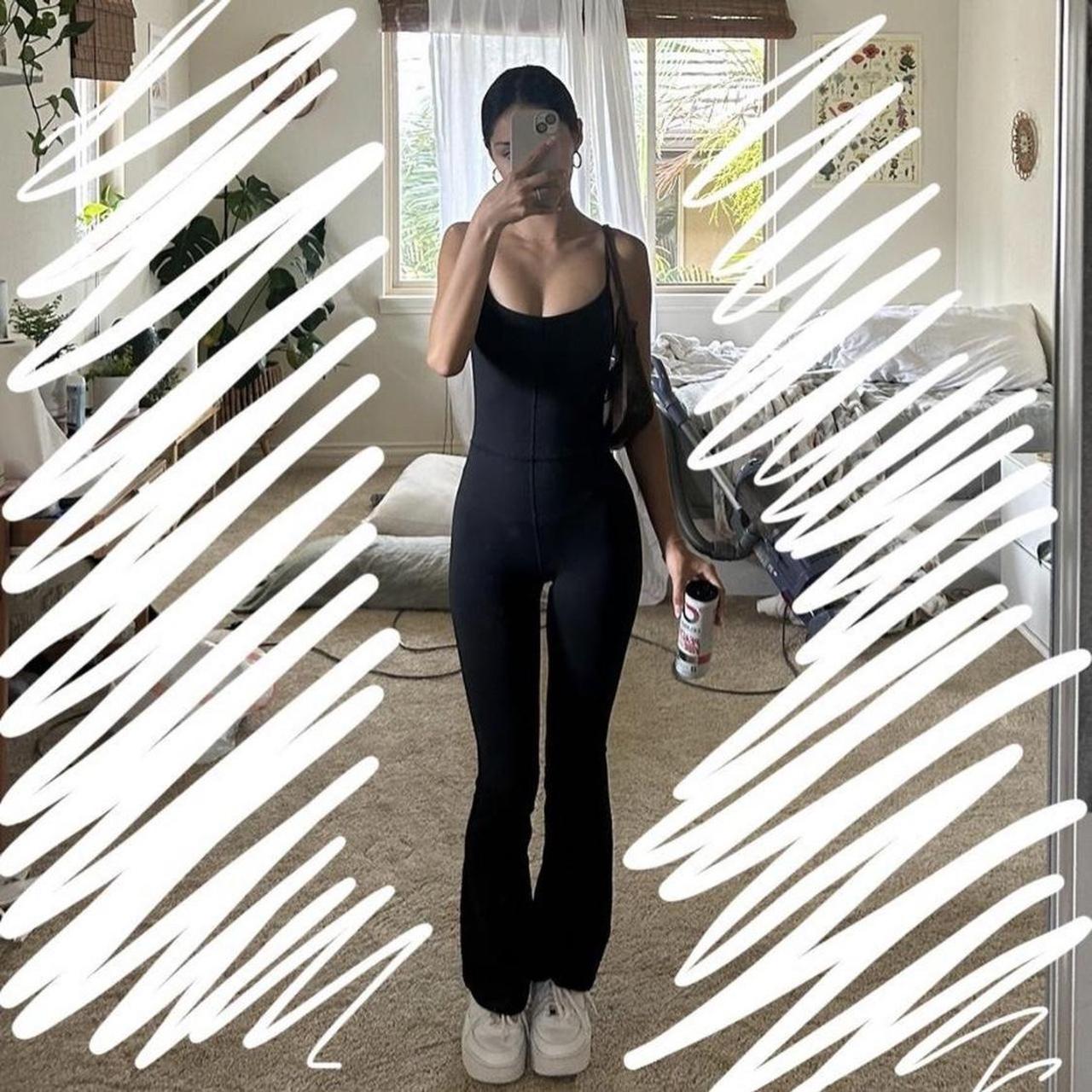 Aritzia Divinity Kick Flare Jumpsuit in Black