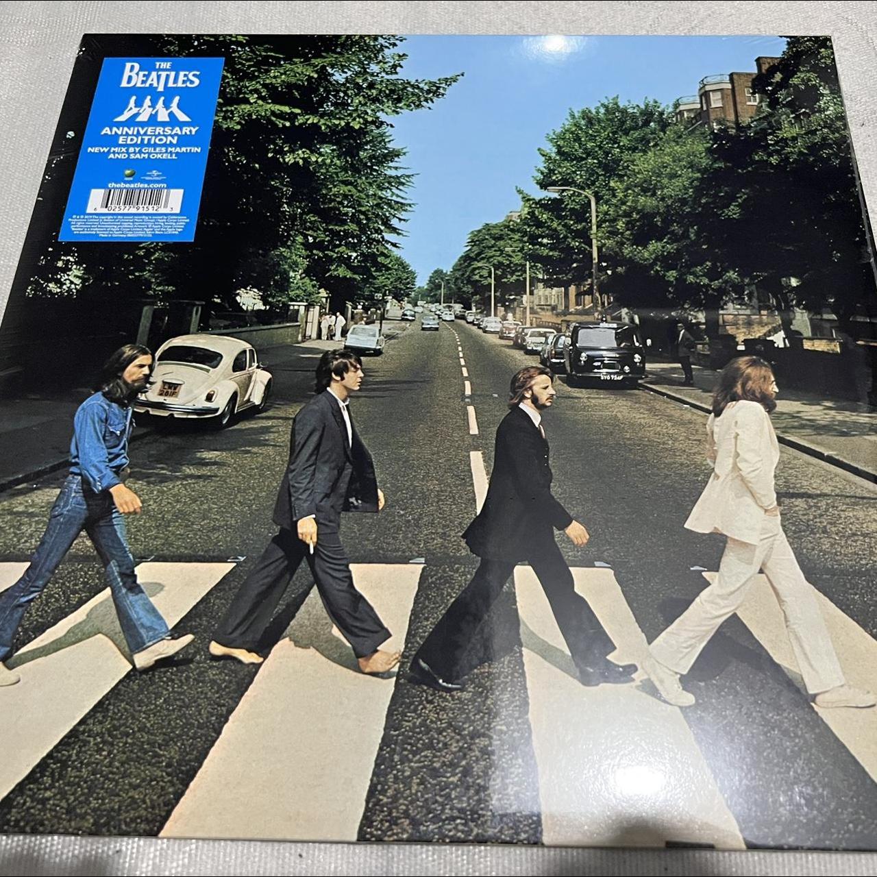 The Beatles Abbey Road anniversary edition, opened... - Depop