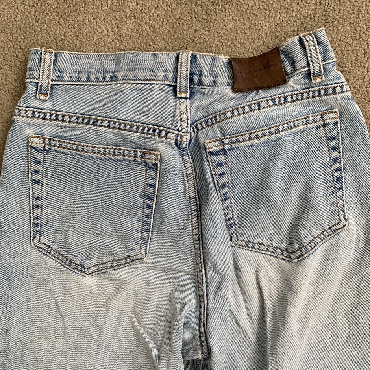 Calvin Klein Jeans Women's Blue and White Jeans | Depop