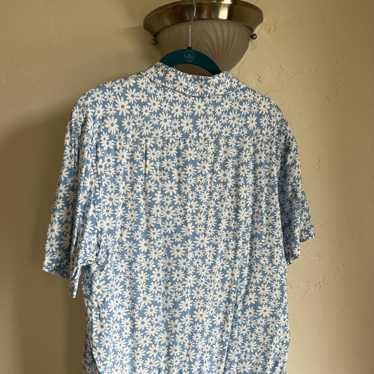 light blue button-down with white flowers! very... - Depop