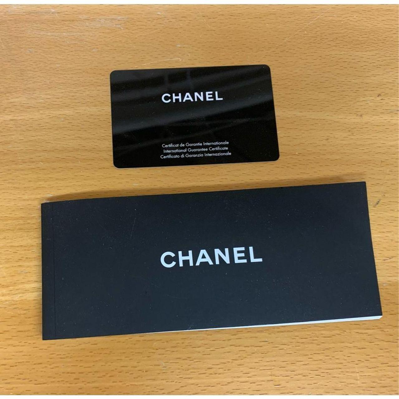 authentic chanel white paper bag with one of the