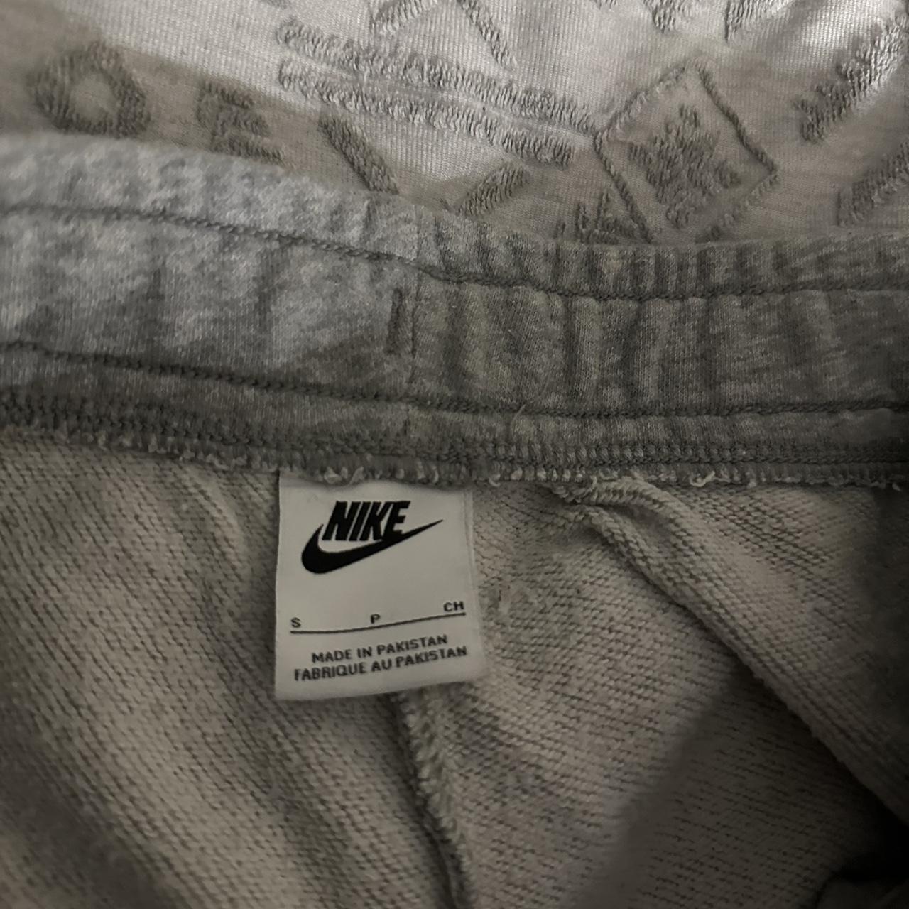 nike grey cuffed tracksuit pants worn condition size... - Depop