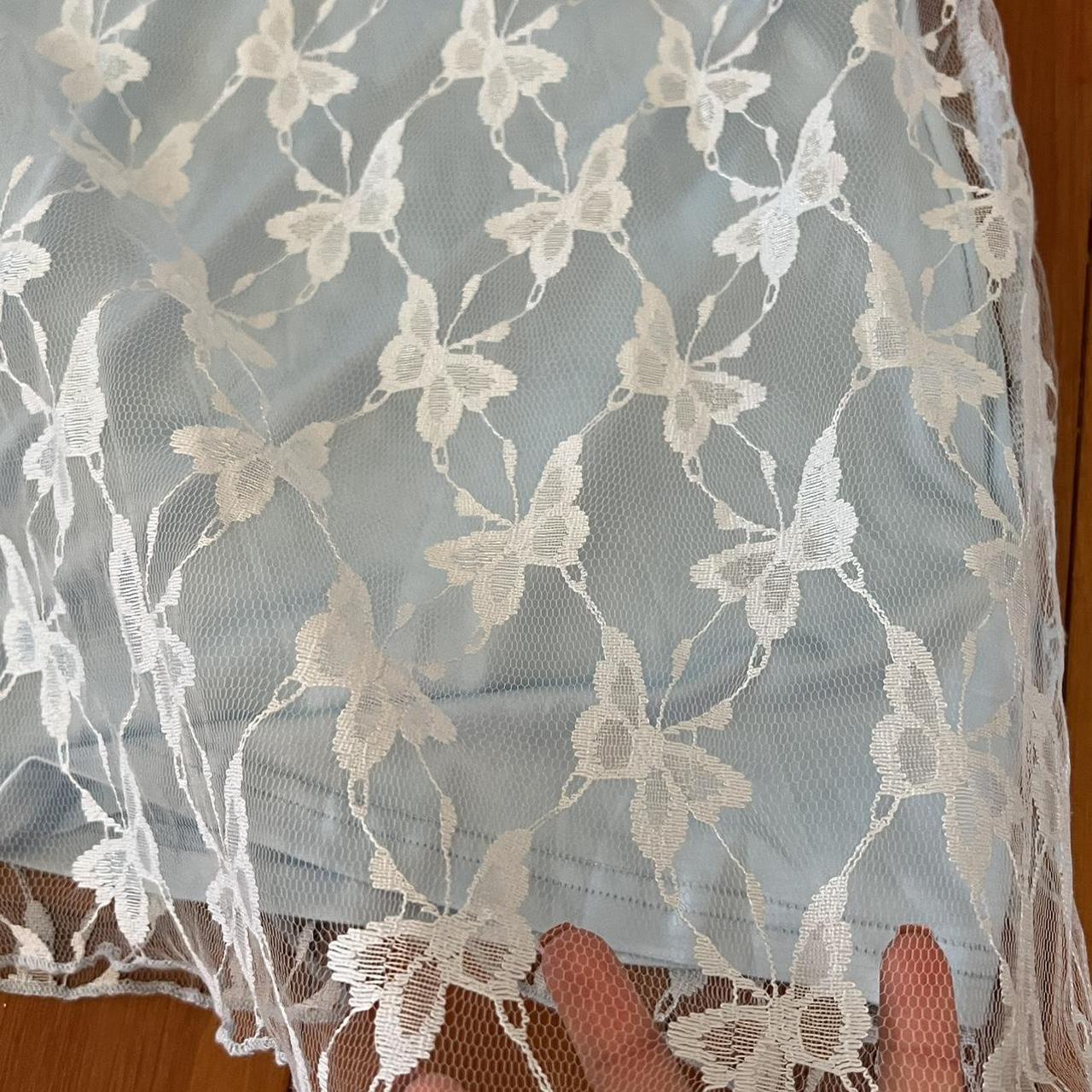 Light blue butterfly lace mini dress from CIDER... Depop