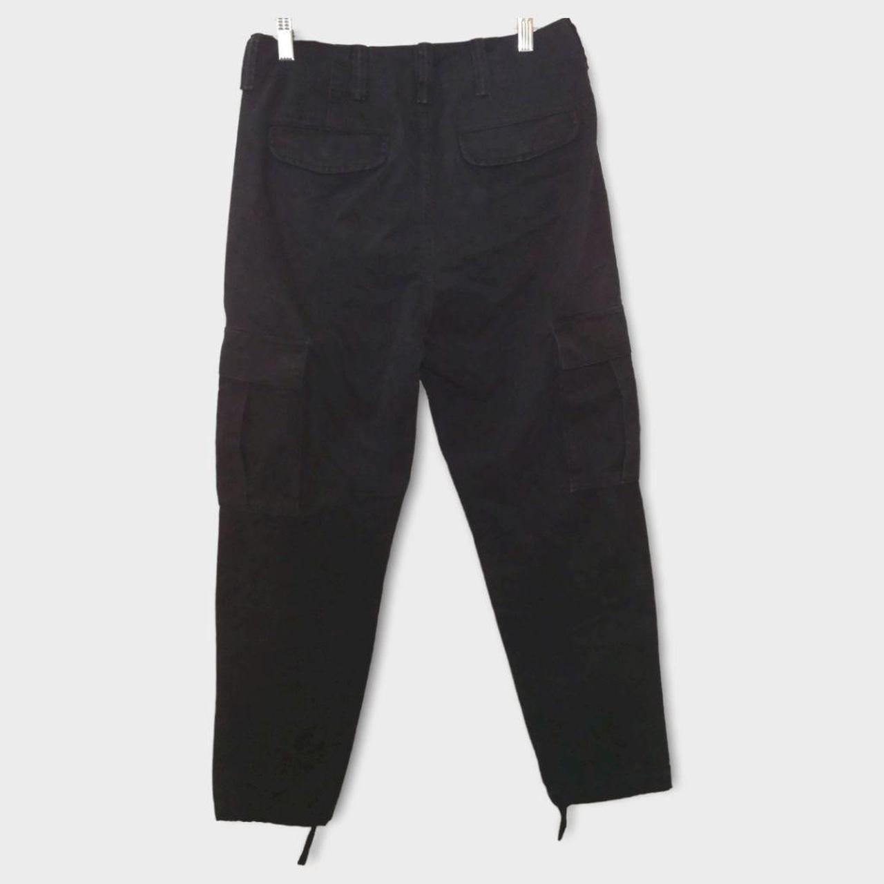 Men's relaxed fit cargo pant in black by Banana... Depop