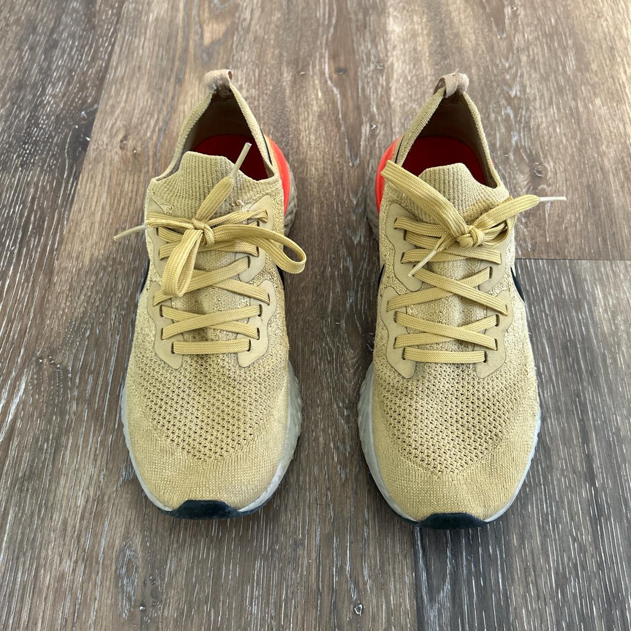 Nike epic react club on sale gold