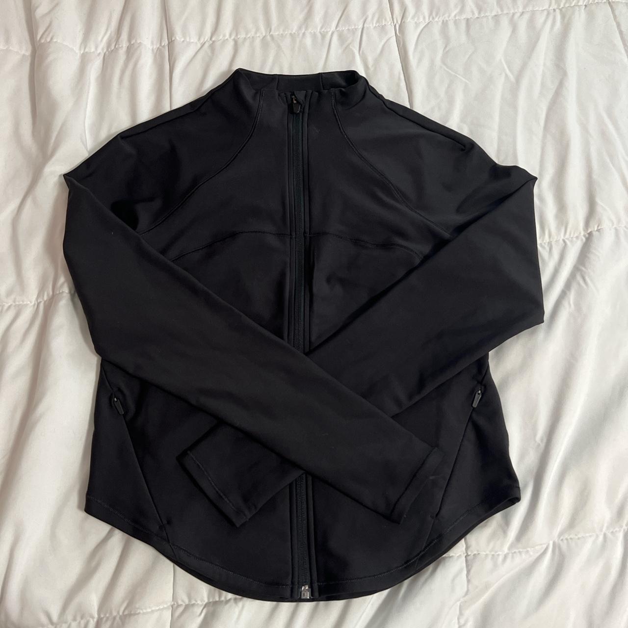 Black athletic jacket in size xs. It is similar to... Depop