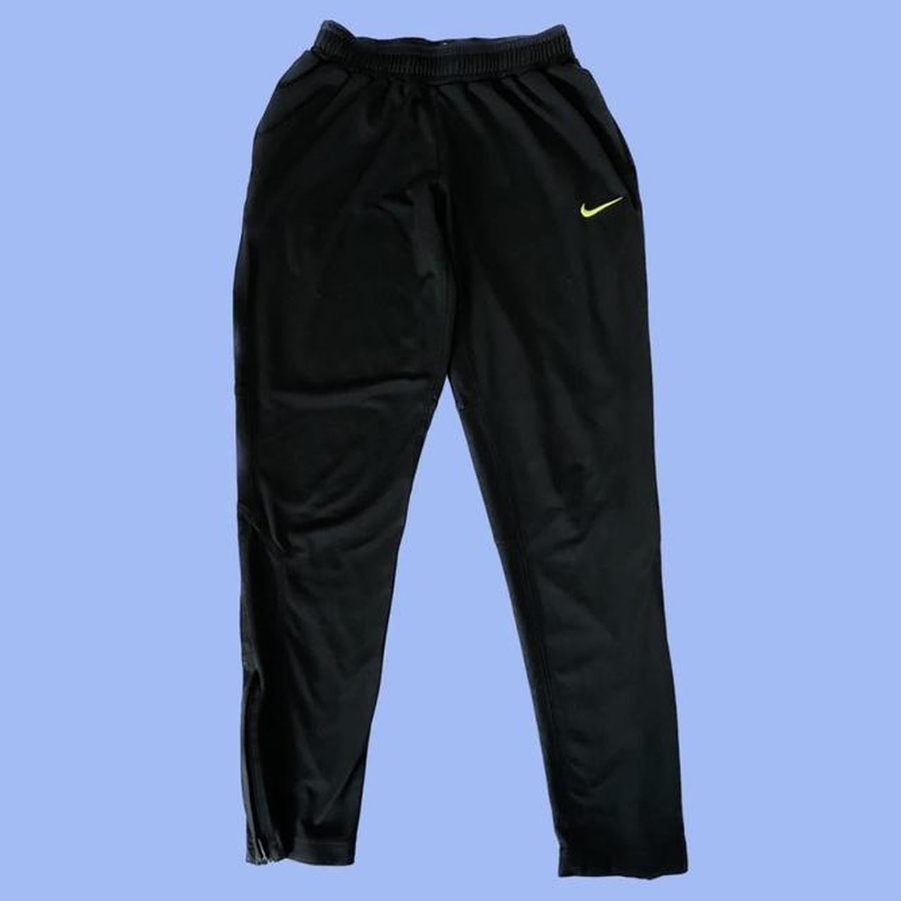 Nike track sales pants zip leg