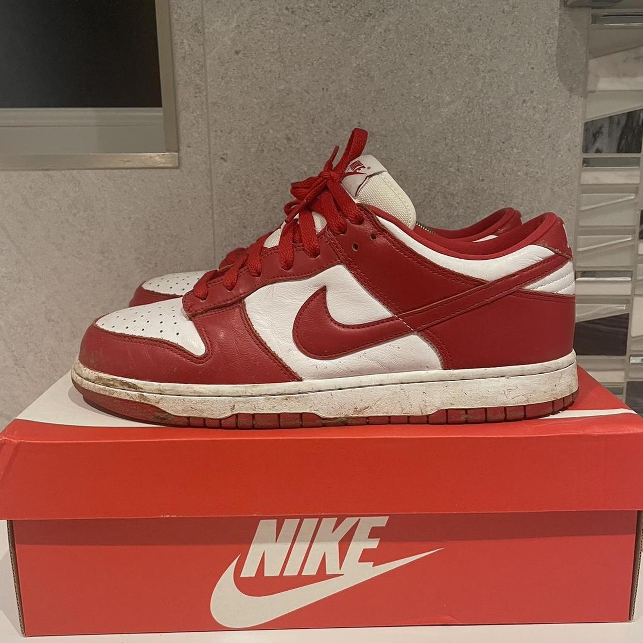 mens nike dunk low university red stores