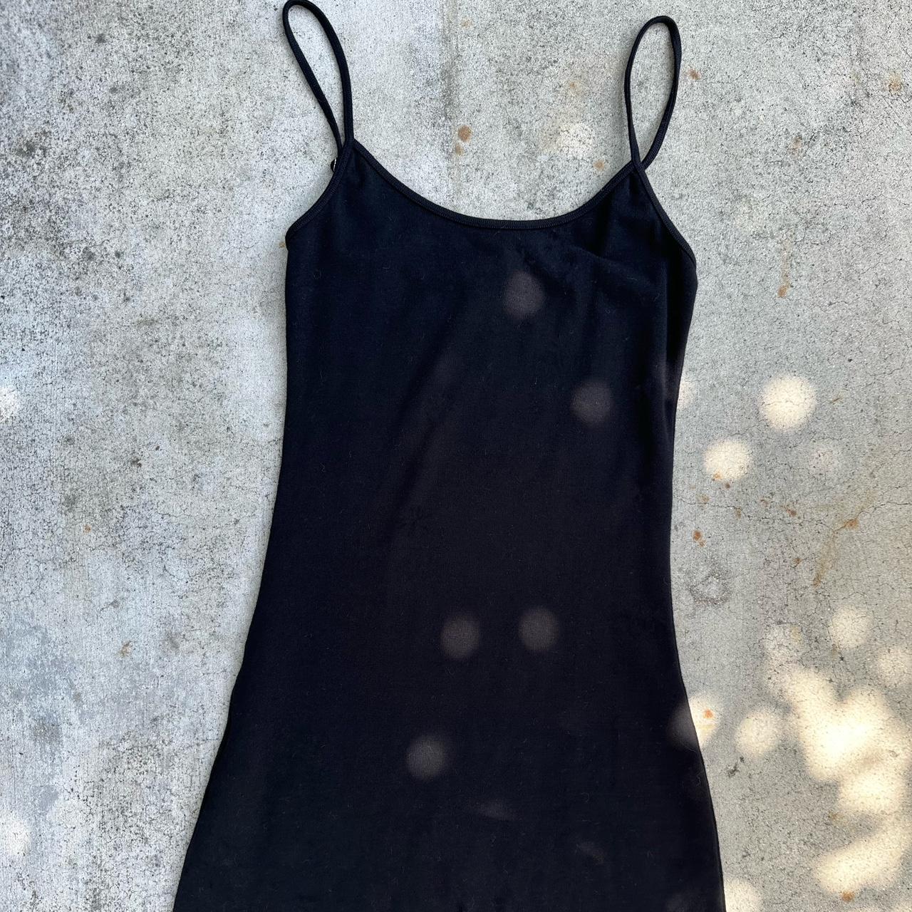 Brandy Melville bodysuit in black Size small Worn... - Depop