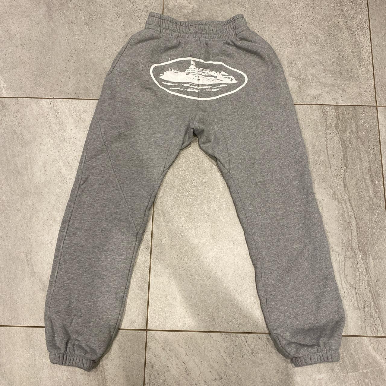 corteiz grey joggers size medium fits small. good... - Depop