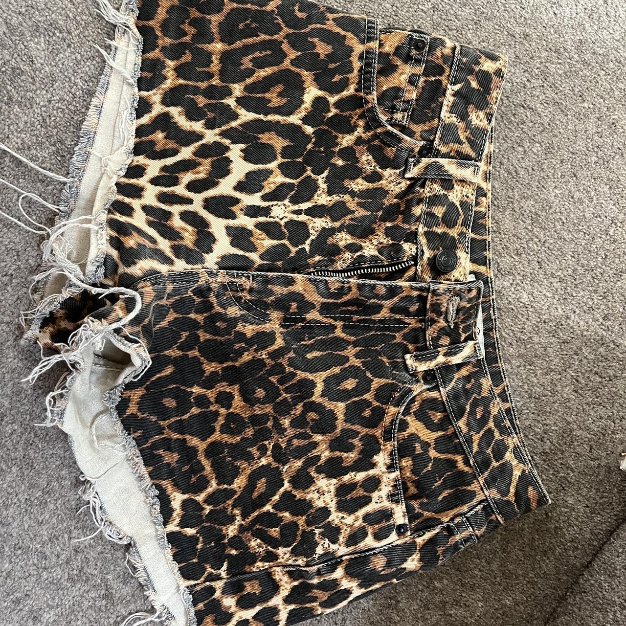 Leopard print denim shorts with fraying. Depop