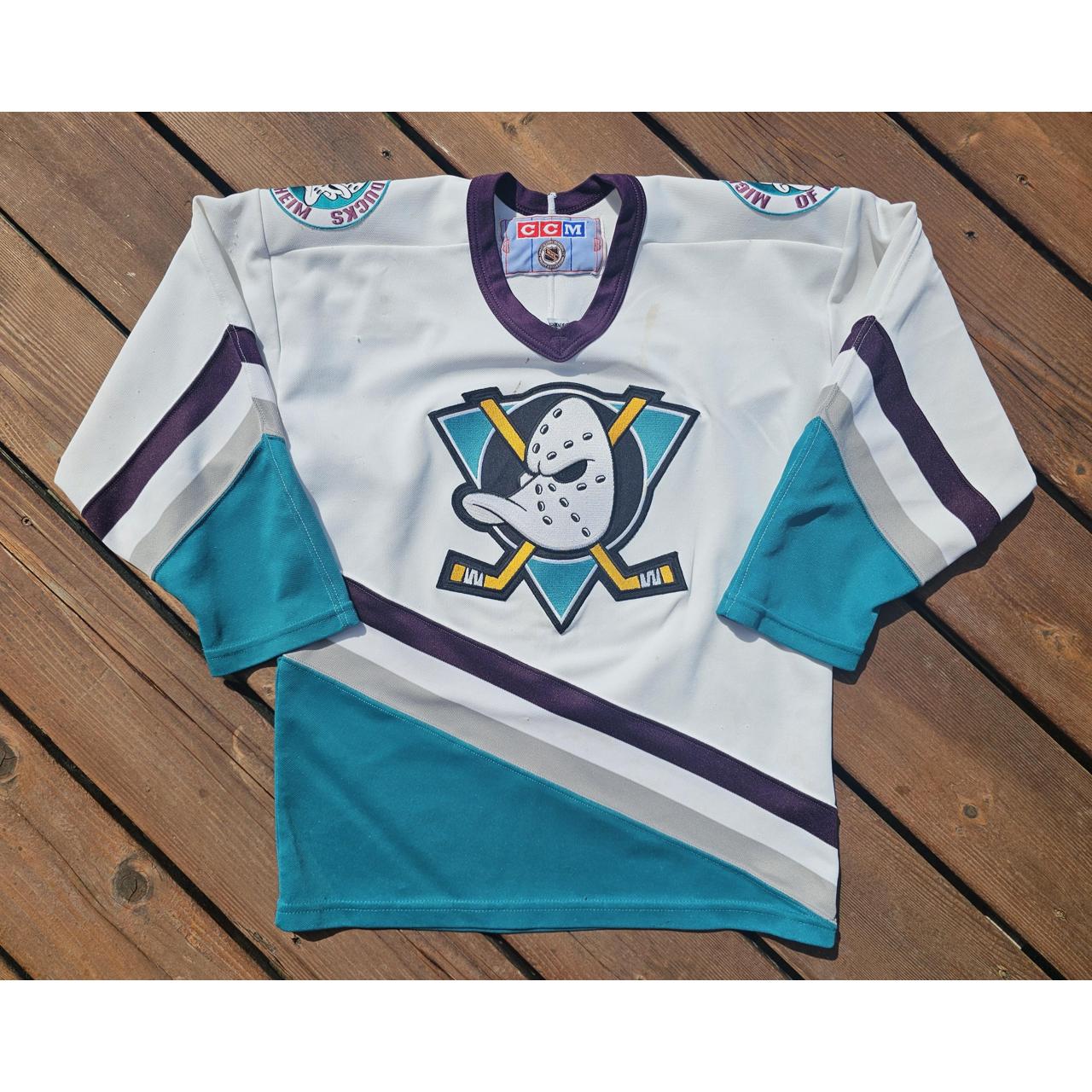 orange and green nike shirt