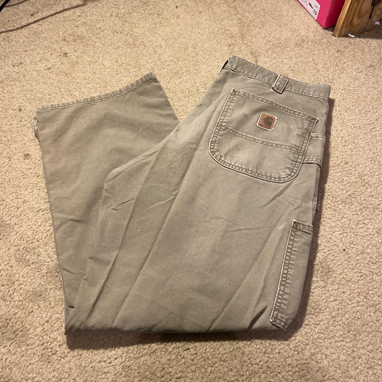 Vintage Carhartt Work pants in used condition with... Depop