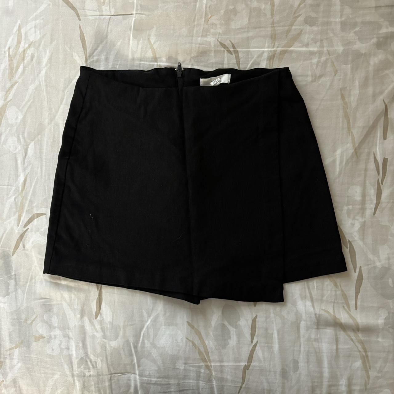 black mini skort size medium but can fit a small as... - Depop