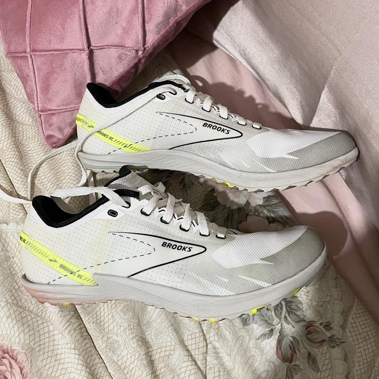 Brooks white and yellow running tennis shoes. Size. Depop