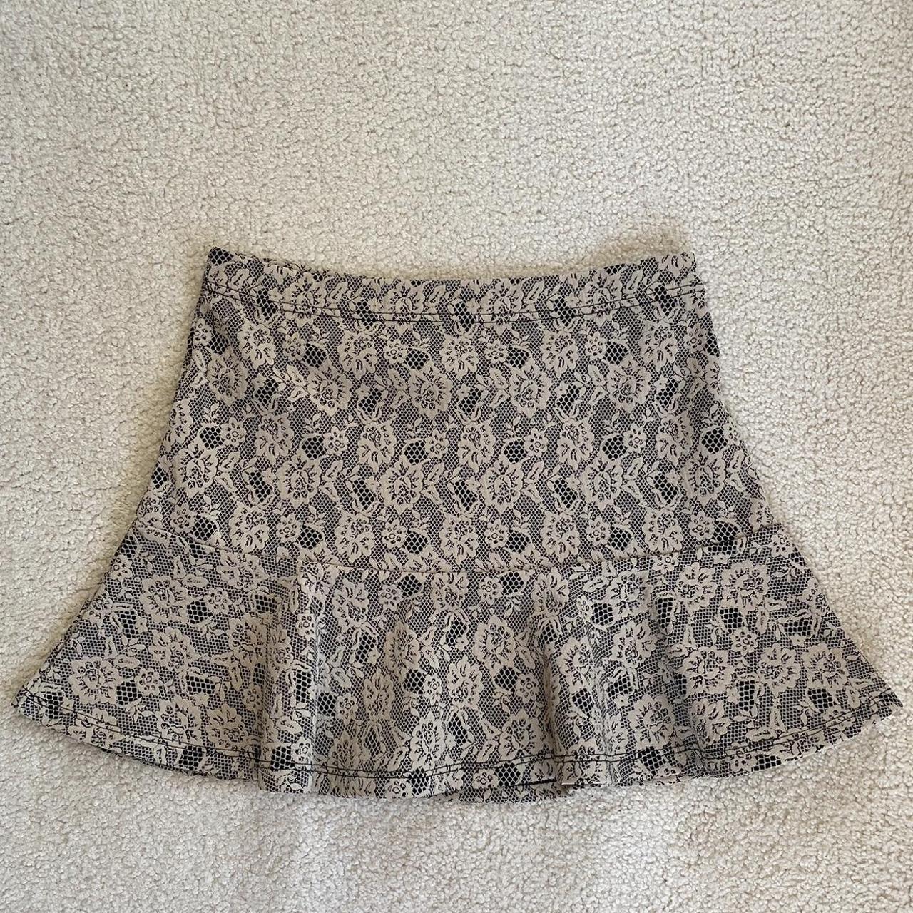 black and cream floral skirt size large thrifted... - Depop