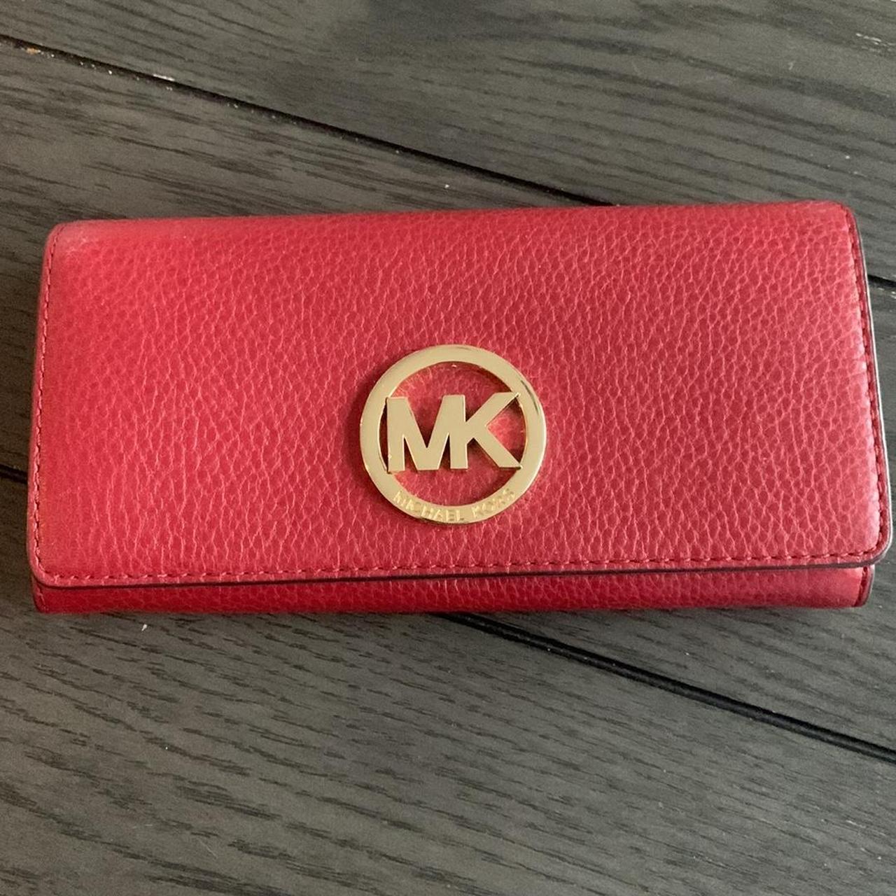 Barely used Michael Kors red wallet. Super cute and