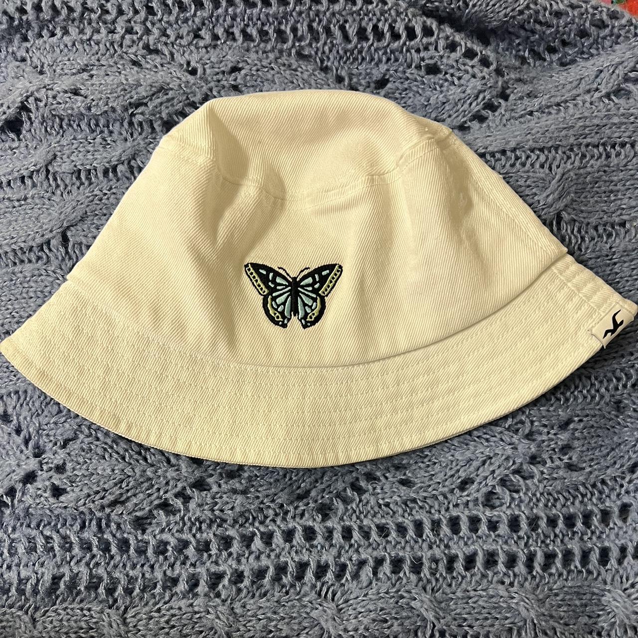 super cute hollister butterfly bucket hat! fits... Depop