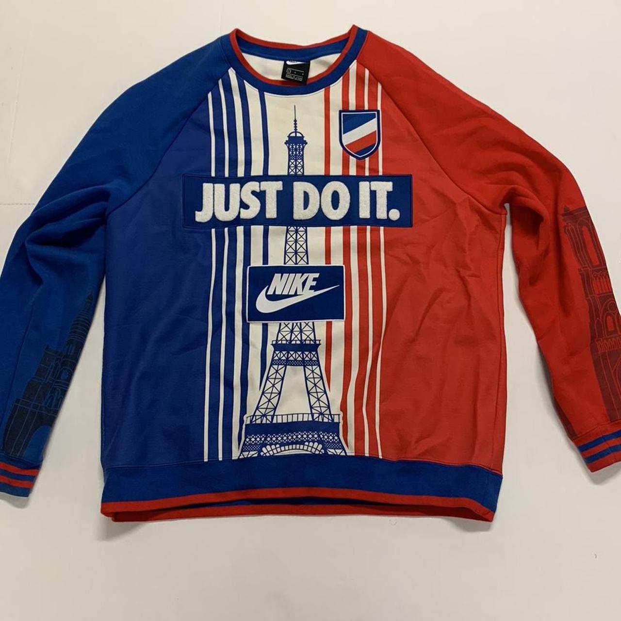 Super sick Red blue and white Nike jumper. Good. Depop