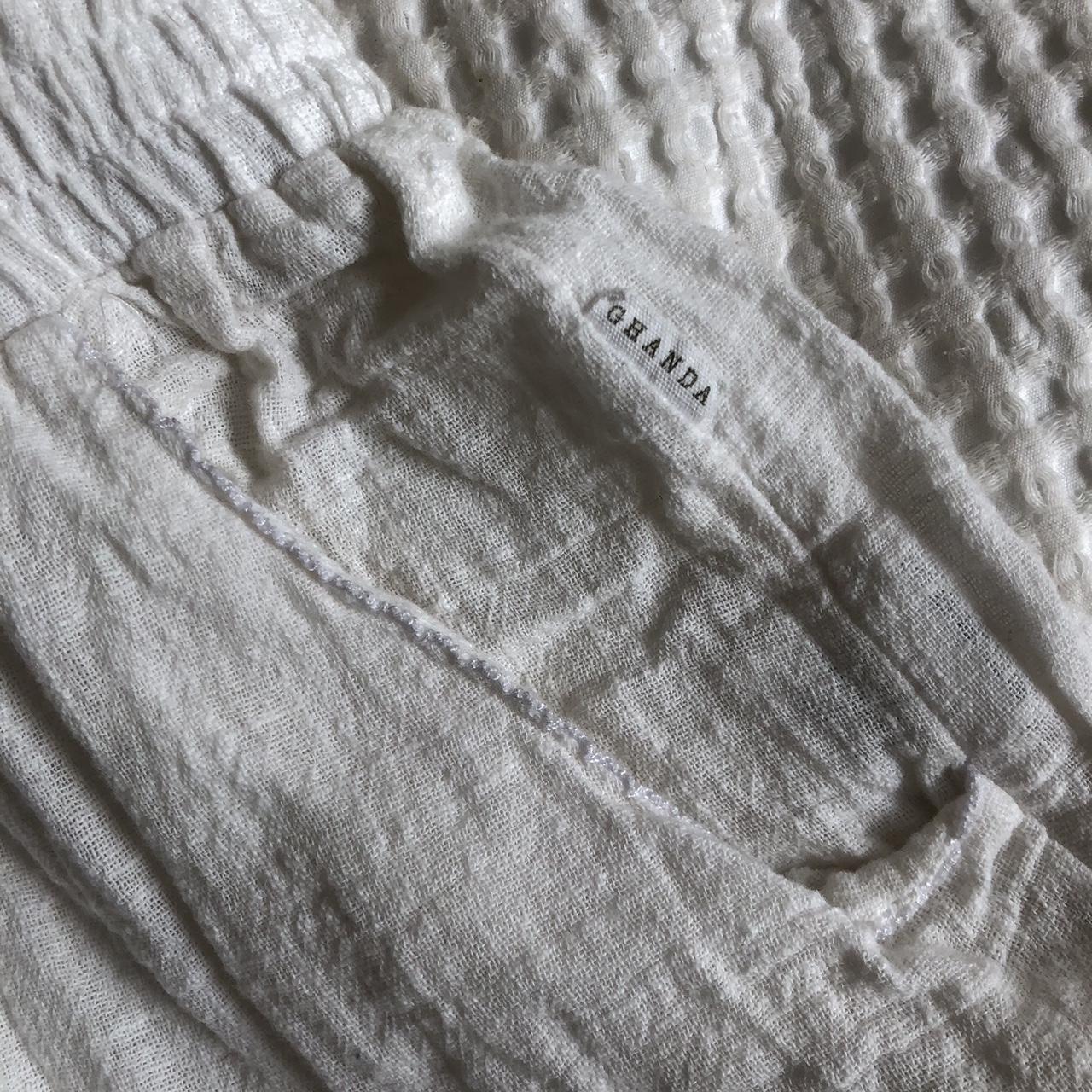 White ghanda beach pants made from cotton Depop