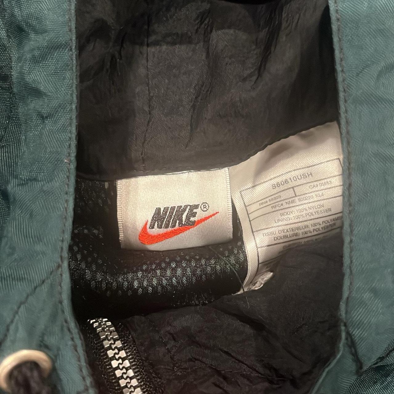 dark green nike windbreaker