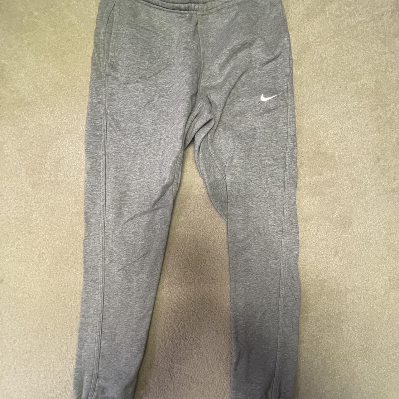 Men s grey Nike sweats Size small Used Tiny rip