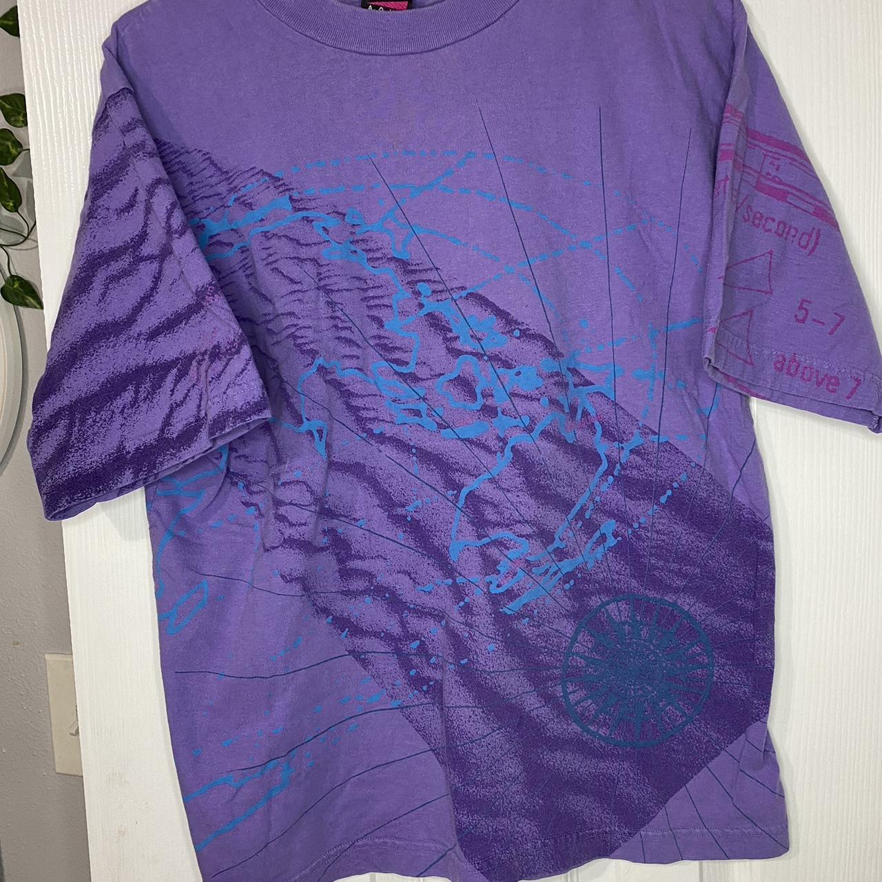 purple and aqua nike shirt