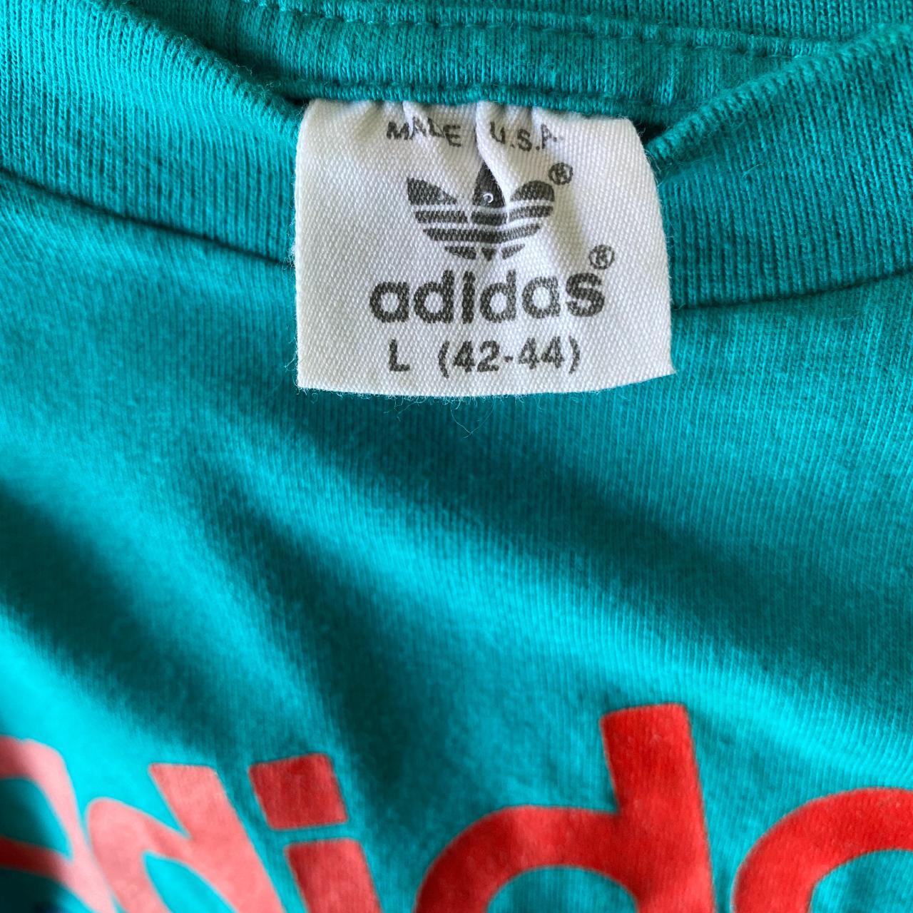 Adidas t shirt tag best sale