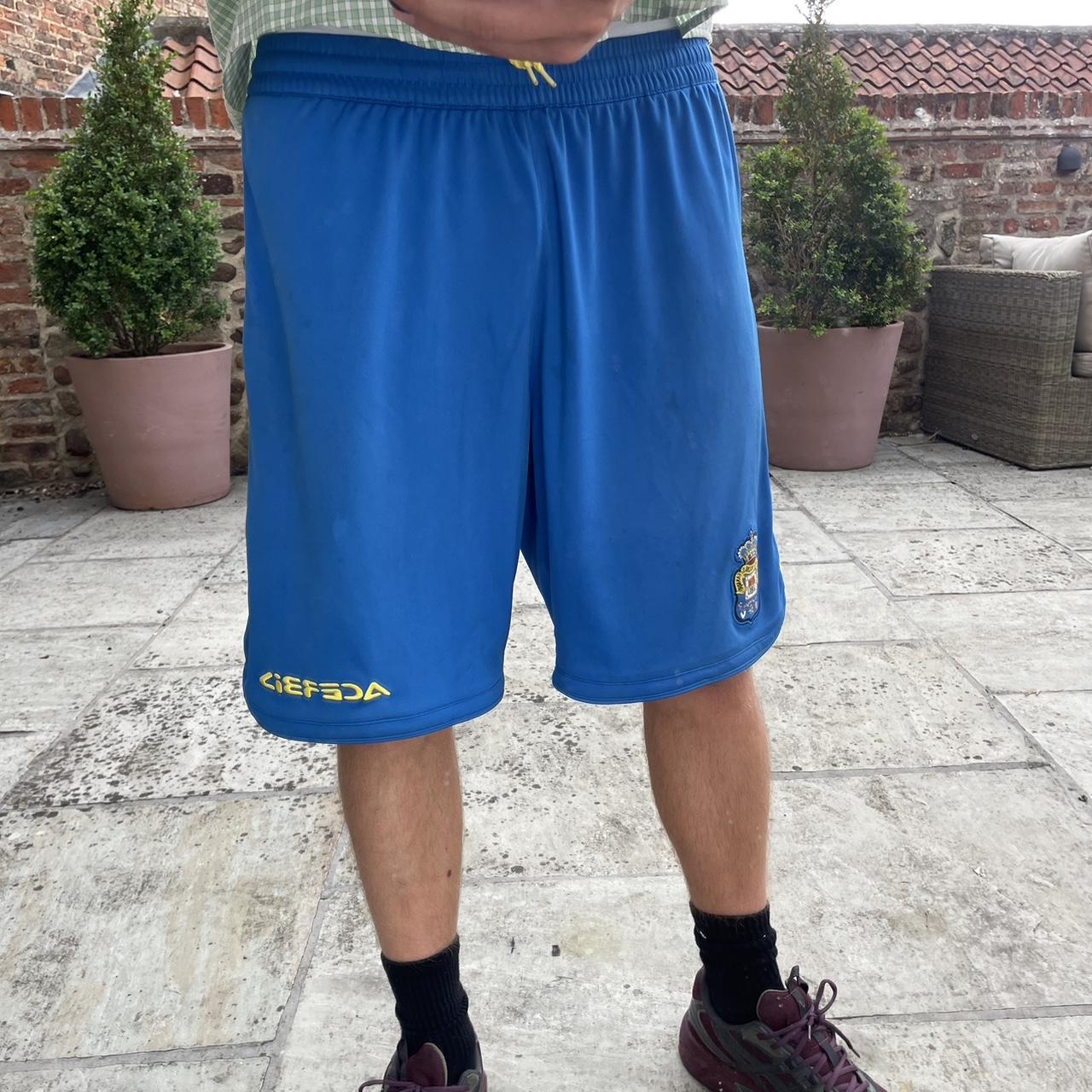 Vintage blue football shorts Sport shorts / long... Depop