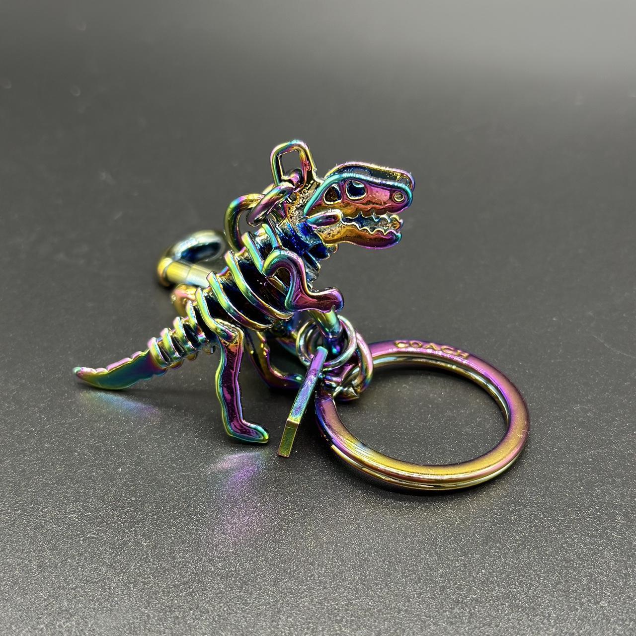 Coach rexy deals oil slick keychain