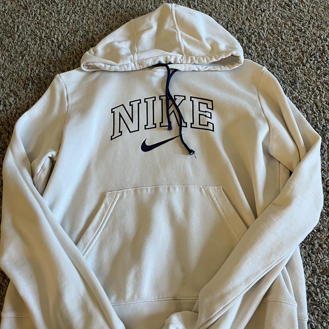 white nike hoodie with orange logo