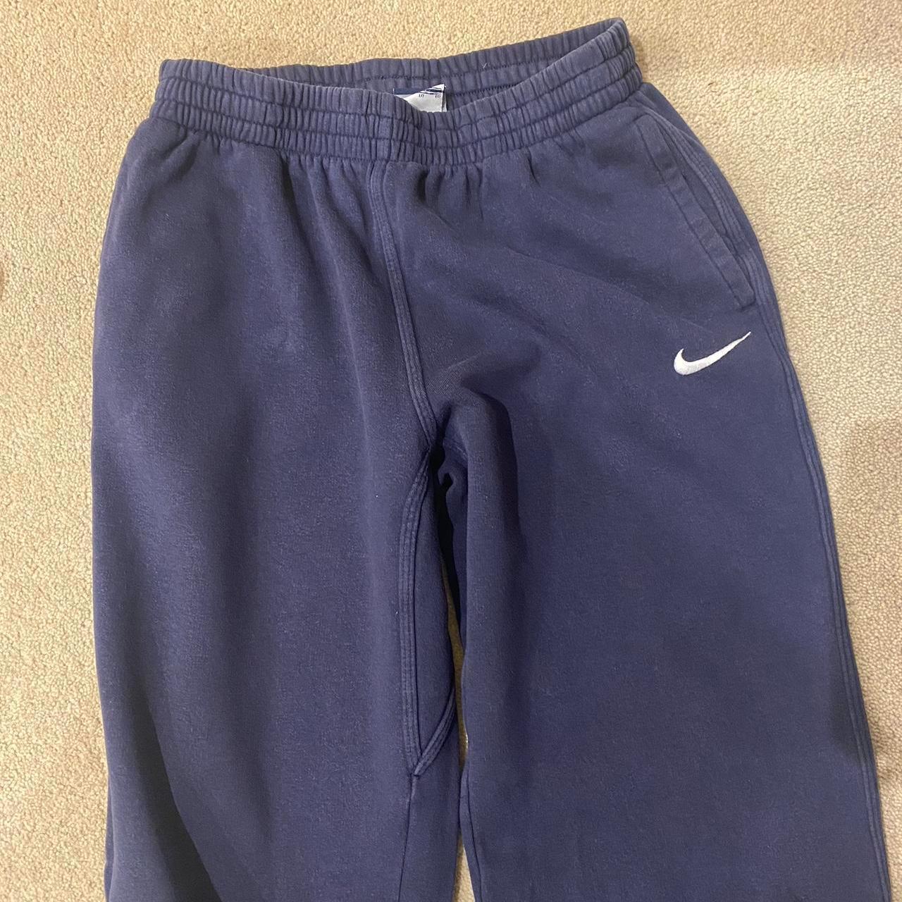 Navy Nike joggers Kids XL (age 13-15) would fit a... - Depop