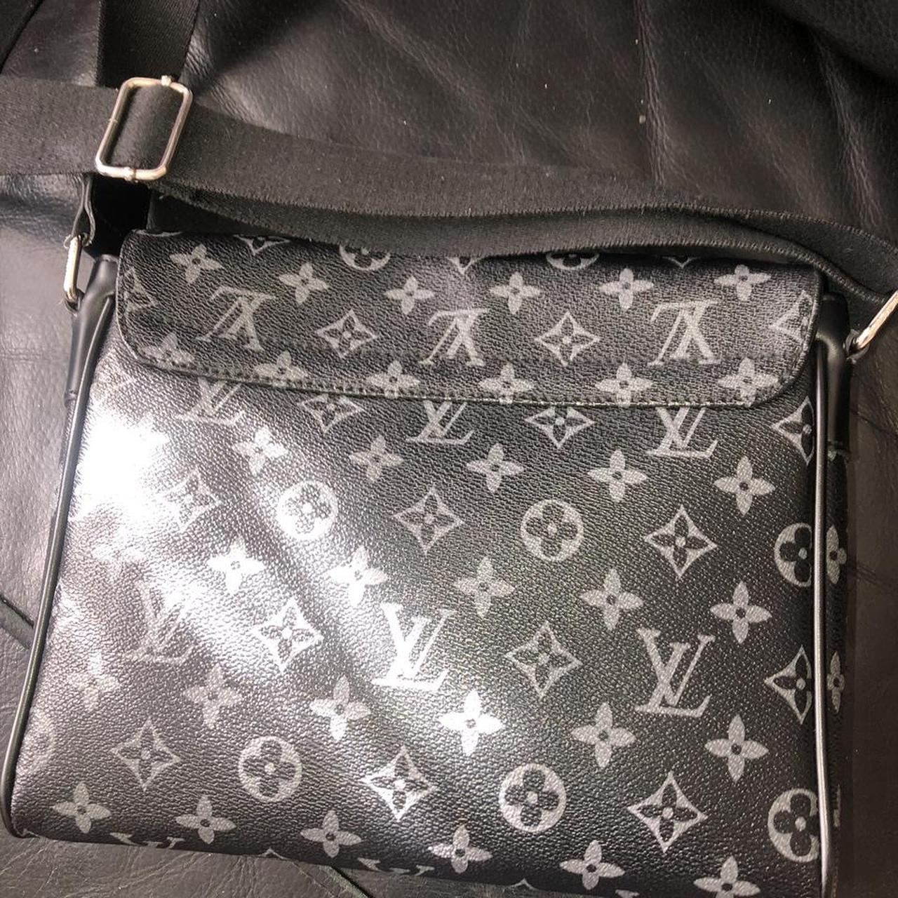 louis vuitton messenger bag .with reciepts used... Depop